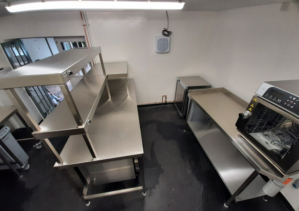 Brand new commercial kitchen looking shiny and clean